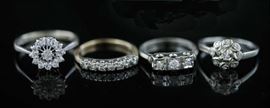 Lot 43: Two 18k white gold and diamond rings with two 14k diamond rings, 4 total