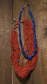 Lot 48: Coral necklace, lapis necklace and one pair of earrings
