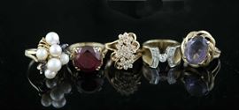 Lot 55: Lot of five gold rings, one with diamonds other with amethyst, one with pearls, 33.5 grams