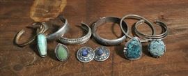 Lot 56: Two sterling silver bangles, four cuff bracelets, four rings and earrings (37 & 60)