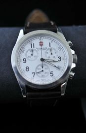 Lot 63: Swiss Army Victorinox watch with leather band