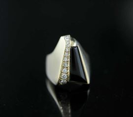 Lot 83: 14k gold diamond and onyx ring, 12 grams