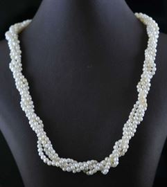 Lot 85: Multi strand seed pearl necklace with diamond clasp