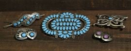 Lot 88: South Western style jewelry: belt buckle, pin, hair pin and two pair of clip on earrings