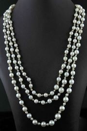 Lot 94: Pearl necklace with cultured and natural pearls w/GIA report and 14k clasp