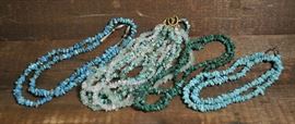 106: Four necklaces including one turquoise