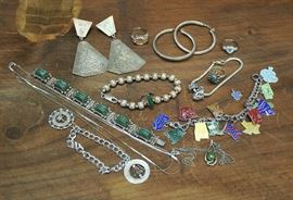 Lot 118: Sterling silver lot, bracelets, some with stones, charm bracelets, earrings, rings, some with jade and necklaces (66,67,75 and 108)