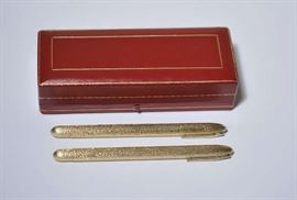 Lot 127: Two 14k gold Cartier felt tip pens in original case