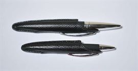 Lot 133: Two Jorg Hysek carbon fiber rollerball pens with leather case