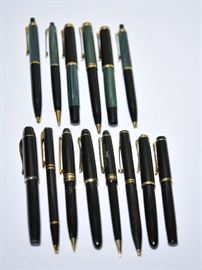 Lot 139: Eight black and gold pens including Pelikan and Sheaffer and six green and black Pelikan pens