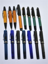 Lot 141: Seven Sheaffer fountain pens, four green Pelikan pens and four orange Faber Castell pens