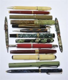 Lot 143: Fifteen colorful plastic pens including Pelikan, Sheaffer, Lamy and Yafa