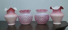 Pair of cranberry rose bowls with two red satin vases