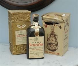 Two antique scotch bottles