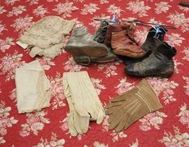 Four pair of antique baby shoes with ladies gloves, etc