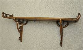 Stick and ball wall shelf