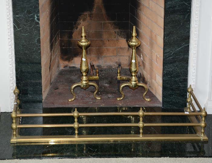 Pair of brass andirons with brass fender