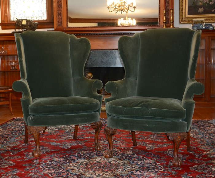Pair of Southwood Furniture wing chairs on claw and ball feet 
