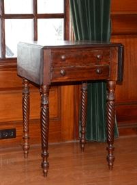 Two drawer Sheraton stand with drop leaves, rope legs
