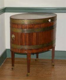 English oval lift top mahogany cellaret or wine cooler