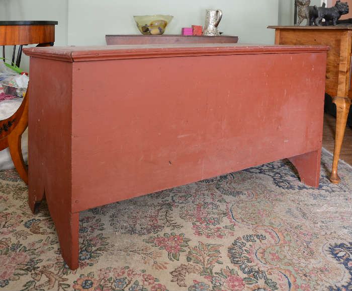 Red painted eight board blanket box, cut out base
