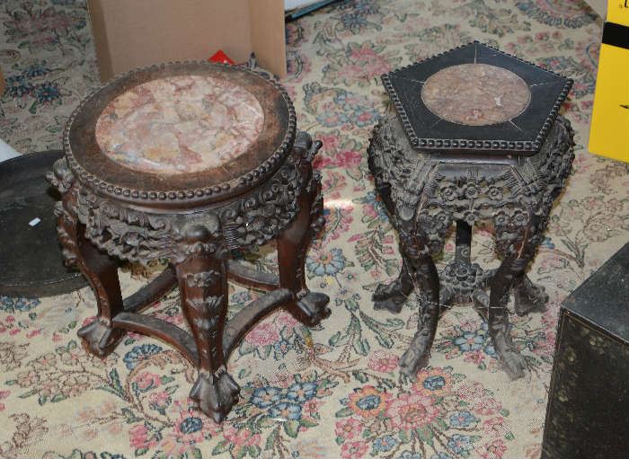 Two Chinese hardwood stands, inset marble