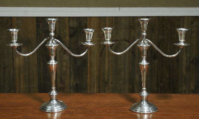 Pair of weighted sterling candelabras 