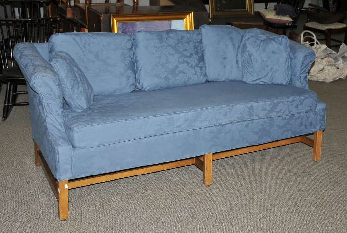 Upholstered camel back sofa, blue