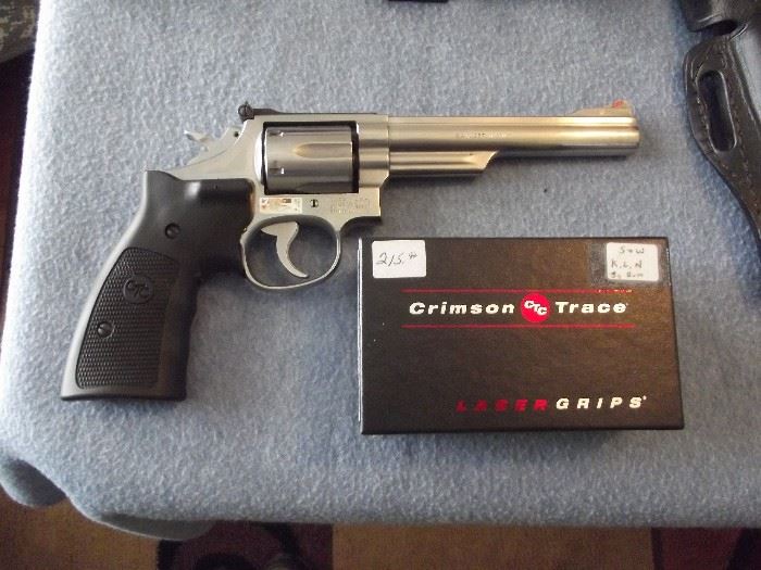 S & W Model 66-2 .357 Caliber with Crimson Grip sight Original box and papers, fully functional. 