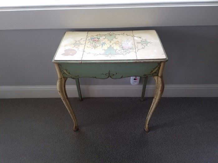 Vintage Style French Side Table. It has three sections for your special items. 