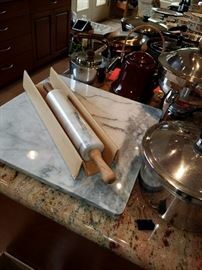 Large Marble Cutting Board and it's associated Rolling Pin. 