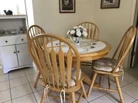Nice tile top kitchen set, Utility cart available as well 42 " with four chairs