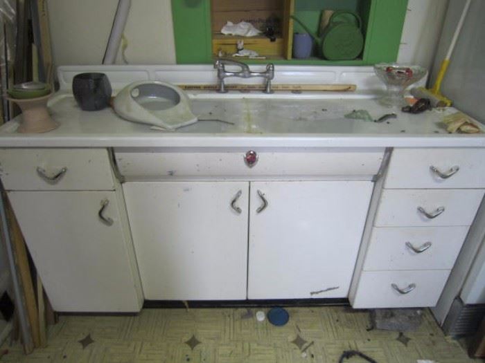 Vintage enamel counter, sink and metal cabinets