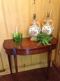 Curved front table; Asian vases (purchased at an antique store in New Orleans) converted into lamps