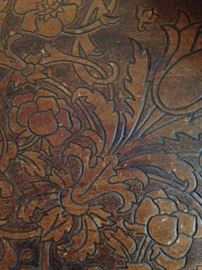 Detailed wood carving on the table