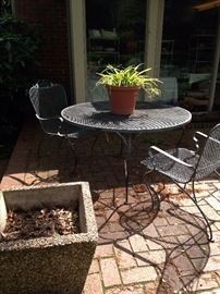 Patio table; 2 chairs (of different design)