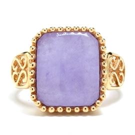 14K Yellow Gold Lavender Jadeite Ring: An 14K yellow gold lavender jadeite ring with beaded bezel edge and accented with openwork scrolls in a high polished finish.