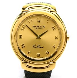 Men's 18K Yellow Gold Rolex Geneve Cellini Watch with Lizard Band: A men’s 18K yellow gold Rolex Geneve Cellini wristwatch with black embossed lizard skin leather band. Includes box and papers.
