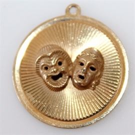 Henry Dankner 14K Gold Theater Charm: A 14K yellow gold charm depicting the masks of comedy and tragedy by Henry Dankner.