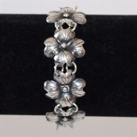 Vintage Hand Wrought Temming Sterling Bracelet: A lovely circa the 1950s to 1960s sterling bracelet by Martin Koop Temming of Temming Art Studio, Saranac Lake, NY. The bracelet is marked ’hand wrought by Temming’ and has a dogwood flower motif. Weight is approximately 0.64 ozt.