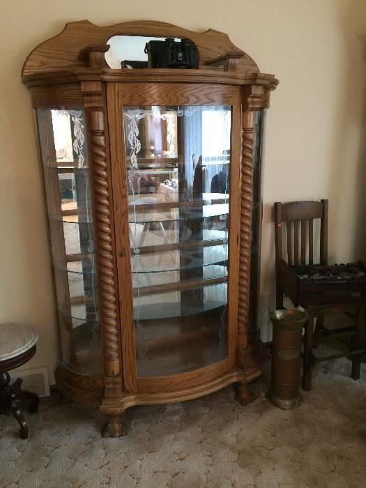 Oak bow front etched glass curio/display cabinet with claw feet