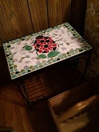 Mosaic tile table with ladybug motif