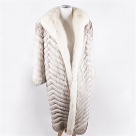 Women's Mano Swartz Fox Fur Coat: A full-length fox fur coat by Mano Swartz. This vintage coat features a white shawl collar and a silk lining. The lining is embroidered "Elise R. Gavison”, and the label reads “Mano Swartz, Baltimore”.