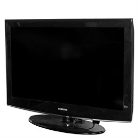 Samsung 37" LCD HDTV: A Samsung model 37" LCD HDTV, model LN37A450C1D and serial number ALMO3CrQ802037W, with 1366 × 768 resolution. A cord, remote control and stand shown are included.