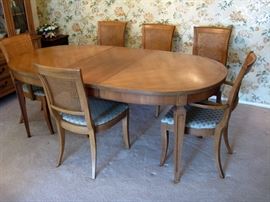 Dining set has 8 chairs total, 2 table leaves & pads, all in good condition