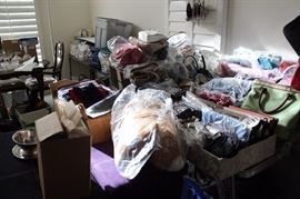 Tables of Designer bags and purses.