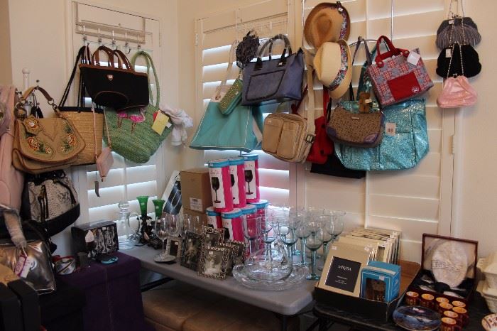 Boxed wine glasses, frames, stemware, hats, purses storage ottamans, USC miniatures.