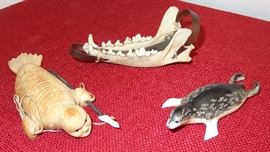 (L) "Spirit Walrus" - Ladd Soonagrook; (R) Ring seal - Paul Apangaluk; (top) fox jaw sleigh