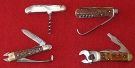 (L/top) John Pritzlaff champagne knife MOP hdl;
 (R/top) George Wolstenholm / Sheffield horseman's knife; (L/bottom) Union Razor Co.; (R/bottom) Cattaraugus Cutlery Co.