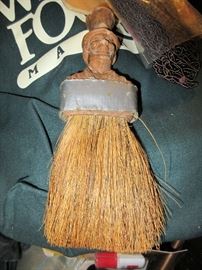 Carved whisk broom